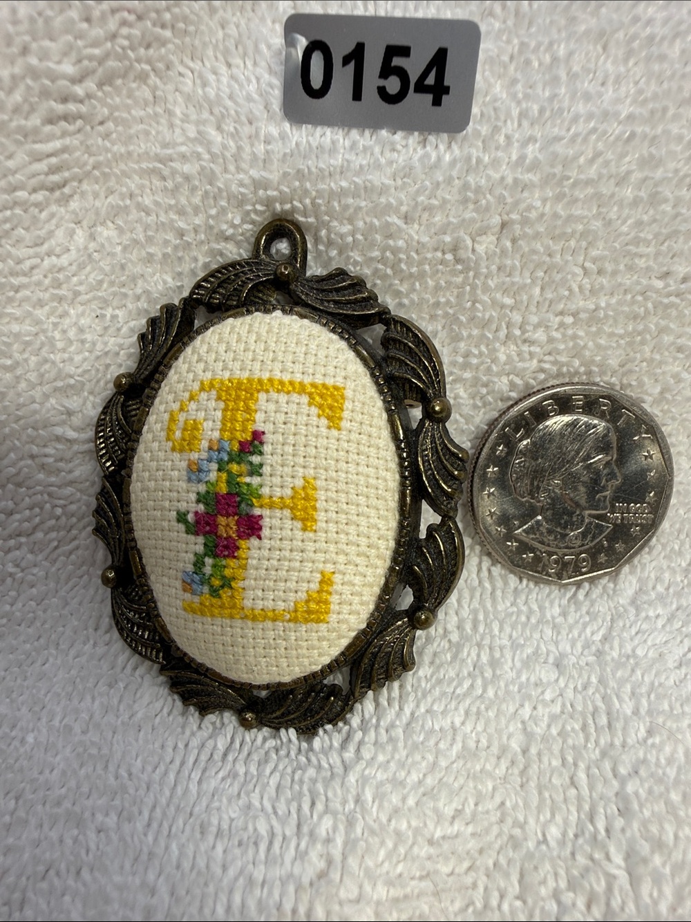 Creative Circle Embroidered Letter “E” Pendant with Floral Accent -